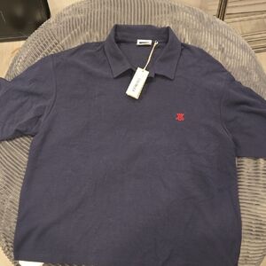 Kith Dark Blue Polo with Red Logo